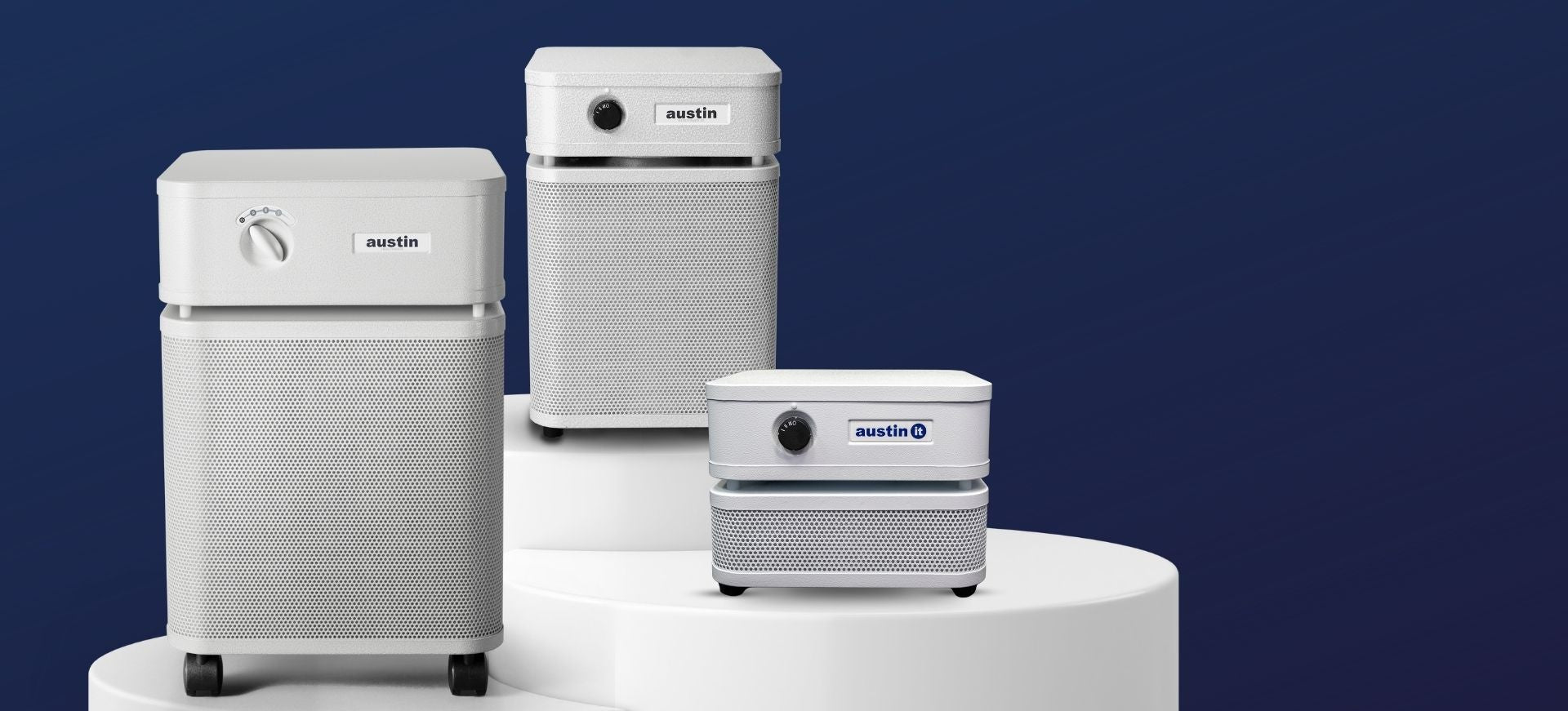 All three sizes of the Austin Air Purifiers pictured on a blue background