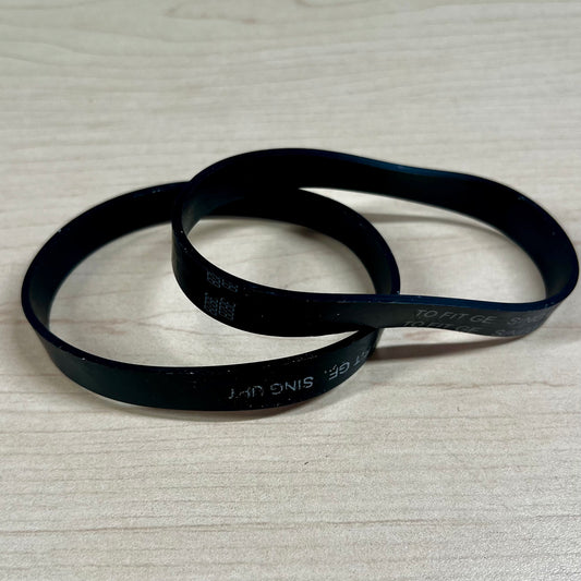 Two vacuum belts sitting on flat surface. These belts fit Riccar SupraLite, Simplicity Freedom, and Titan T500 vacuums.