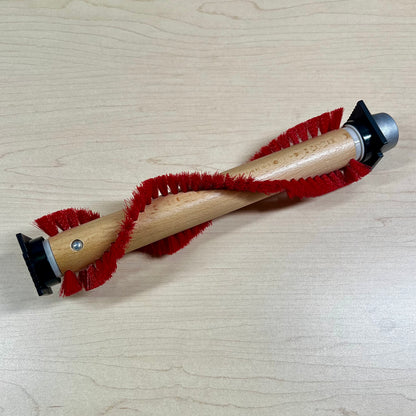 Vacuum brush roll with red bristles for Oreck vacuum cleaners.