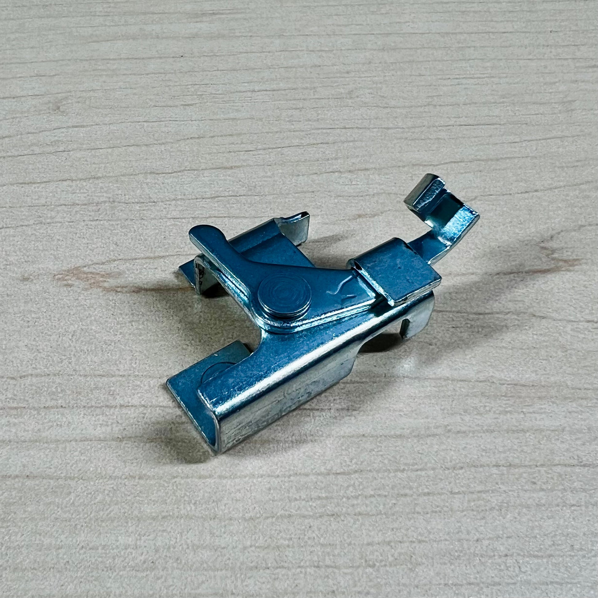 Metal cam bracket for Kirby vacuum transmissions.