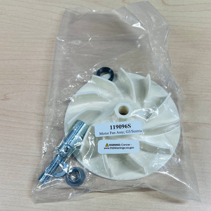 Kirby motor fan assembly in clear packaging on a wooden surface.