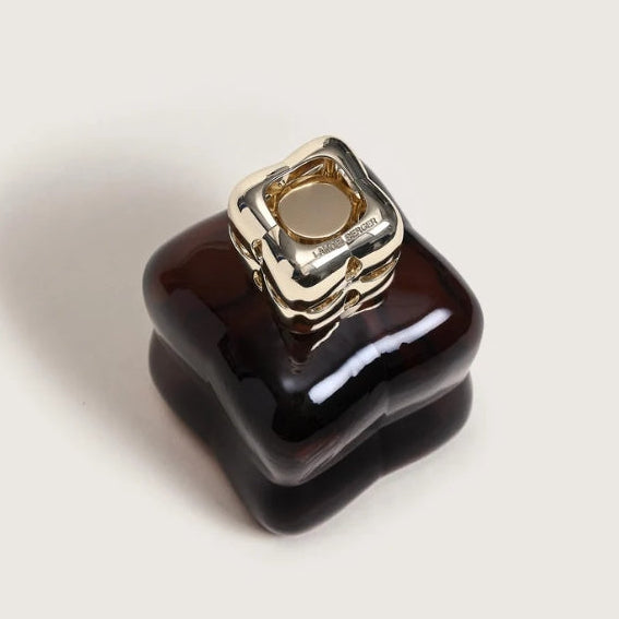 Top view of the Lampe Berger catalytic diffuser from their Cozy collection, in the color Prune.
