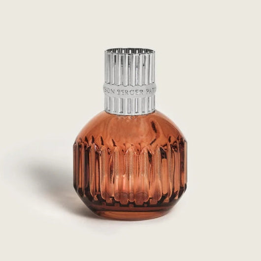 Paprika colored glass home fragrance bottle with silver cap
