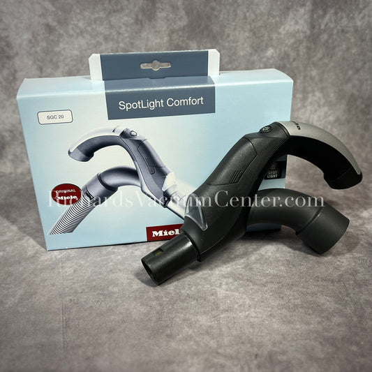 Miele SpotLight Comfort vacuum attachment with packaging.