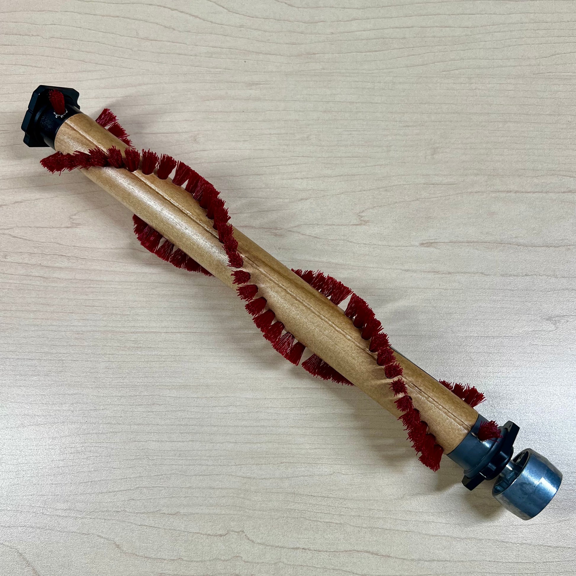 Wooden brush roll for Oreck XL21 vacuums.