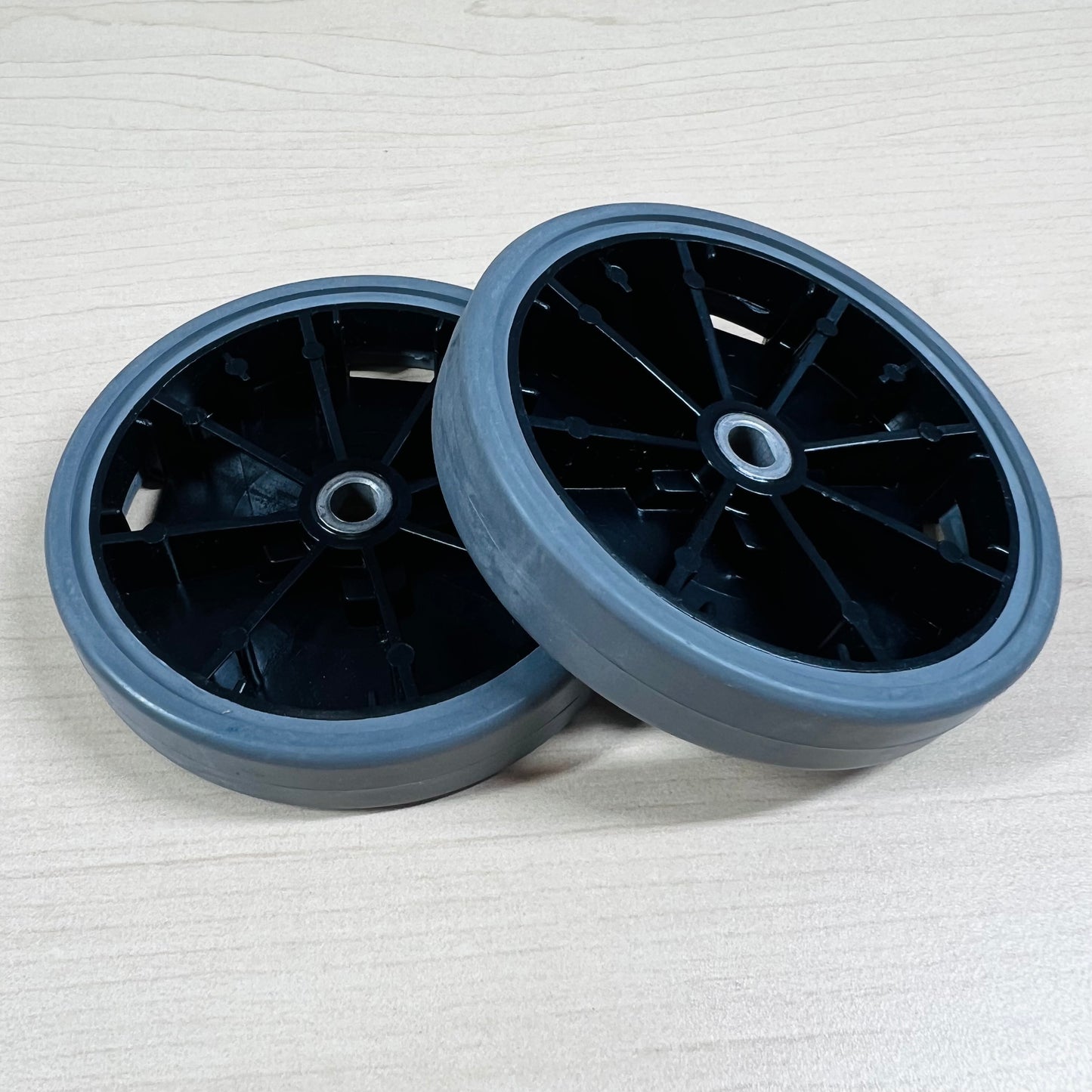 Two rubber coated rear wheels for Kirby vacuums.
