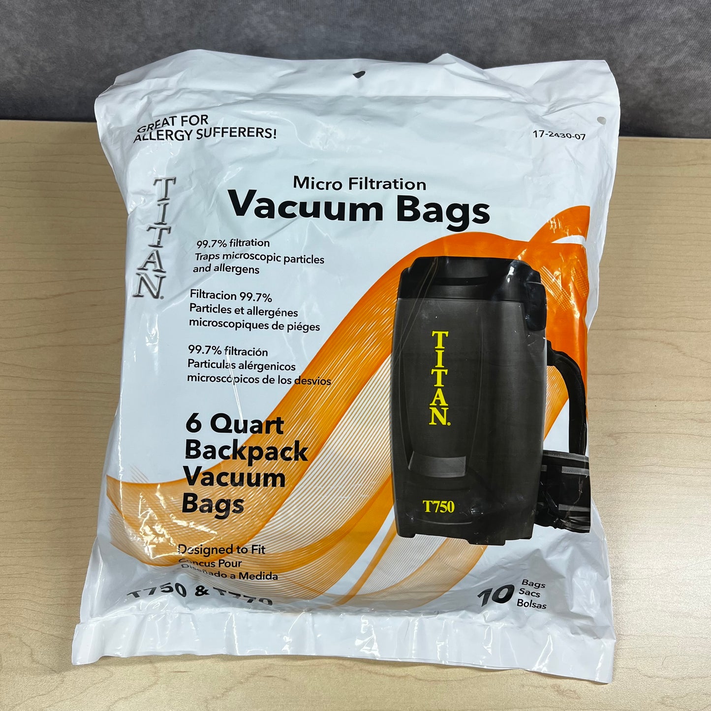 Package of 10 Titan Micro Filtration Vacuum Bags on a wooden surface